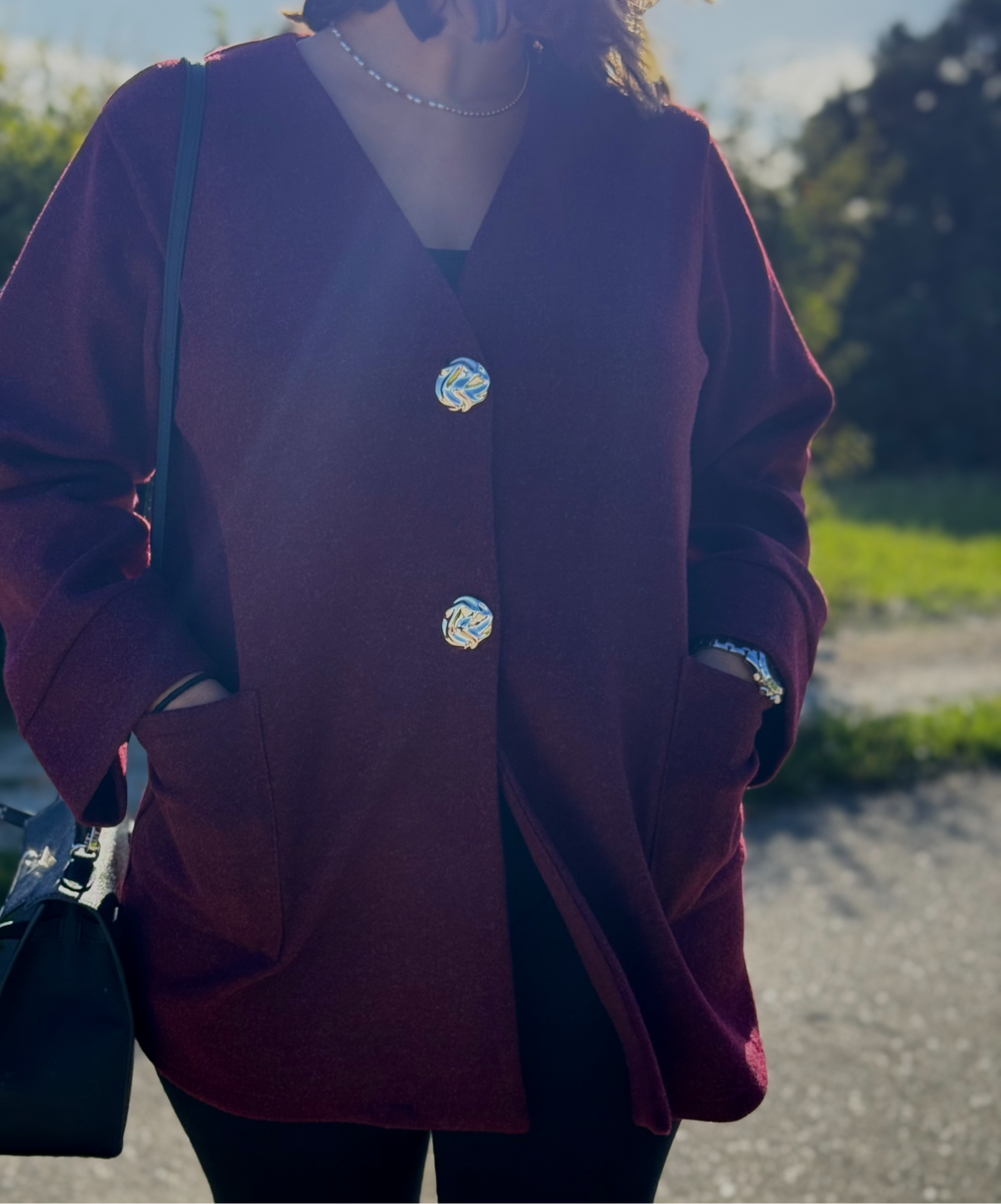 Gilet bordeaux à boutons or