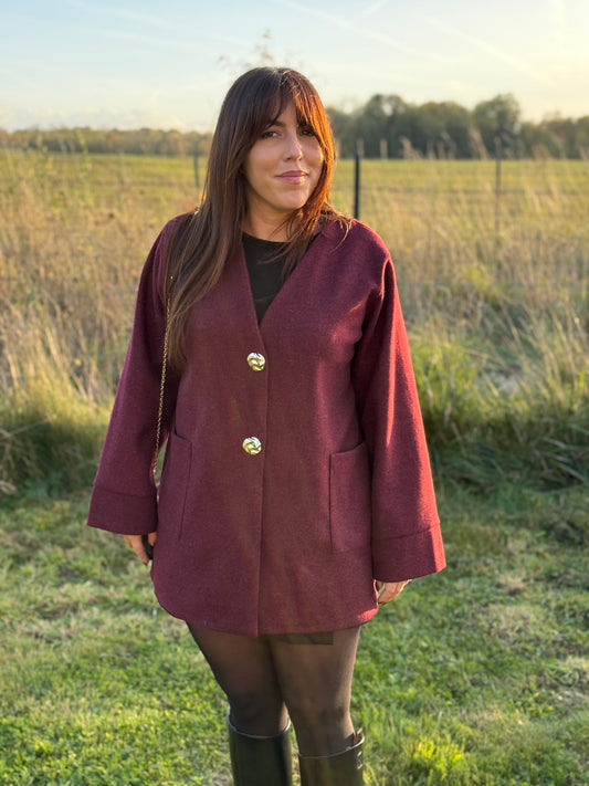 Gilet bordeaux à boutons or